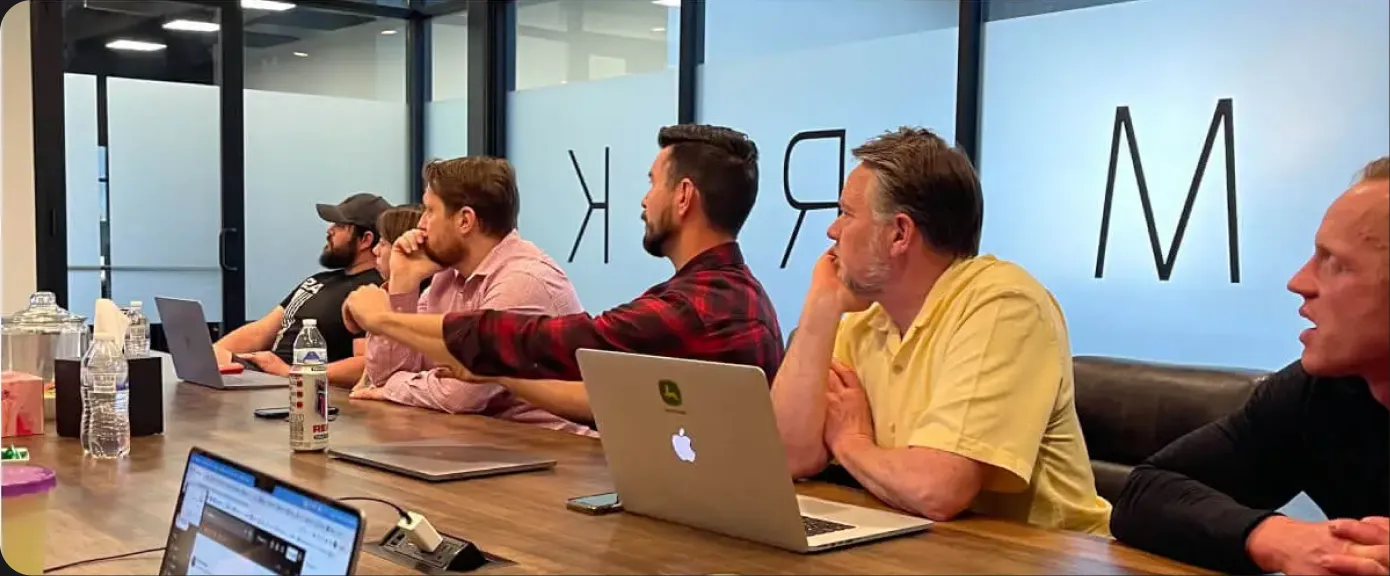 RedSky team collaborating around the conference table